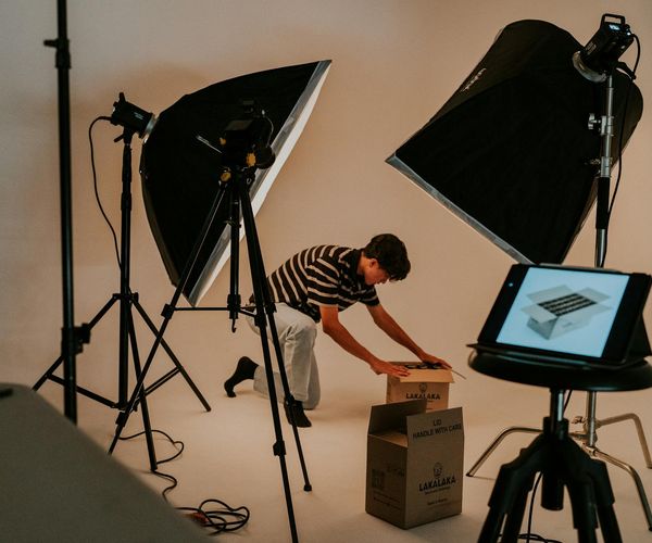 Professional content creation studio with camera equipment and lighting setup